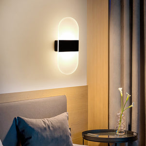 Side profile of the slim minimalist LED wall sconce showing low wall depth