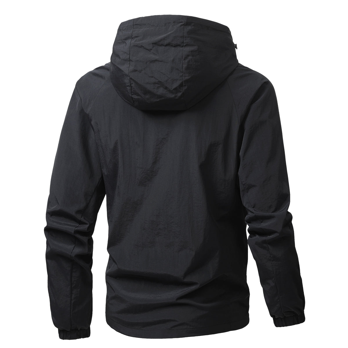 Close view of the black perforated mesh lining inside a nylon hooded jacket