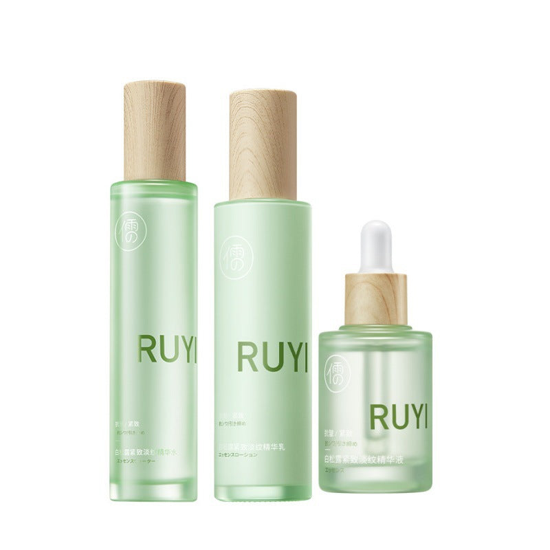 Anti-aging skincare set paired with a towel and everyday bathroom items