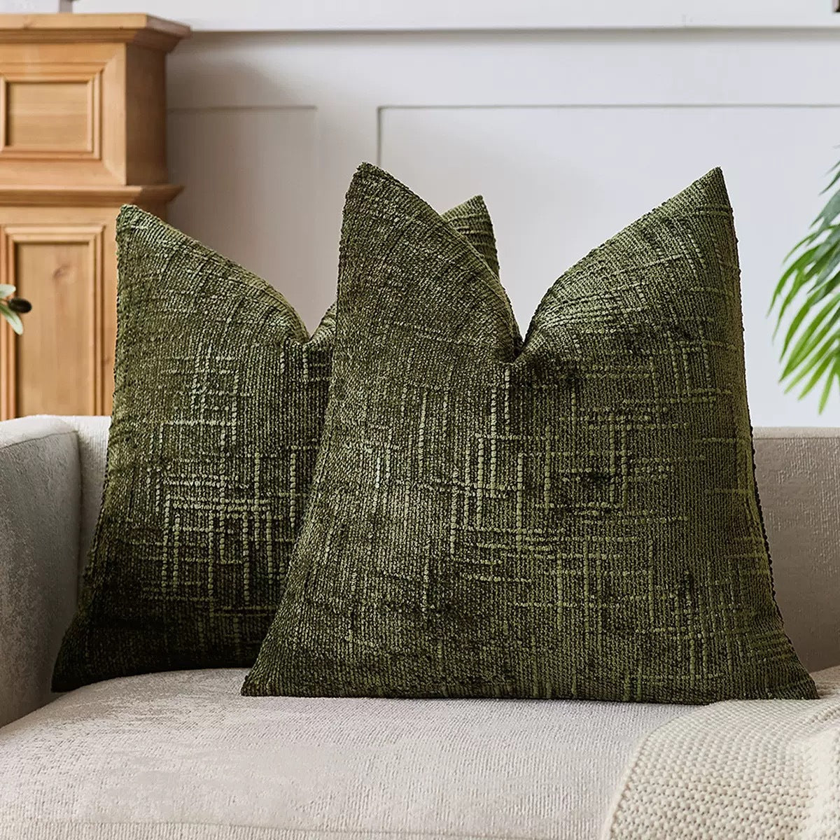 Soft chenille pillow cover in a single solid tone, its tufted crosshatch weave catching the light on the surface