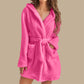 Rose Red plush hooded fleece robe with tie belt, worn by a model, size L option