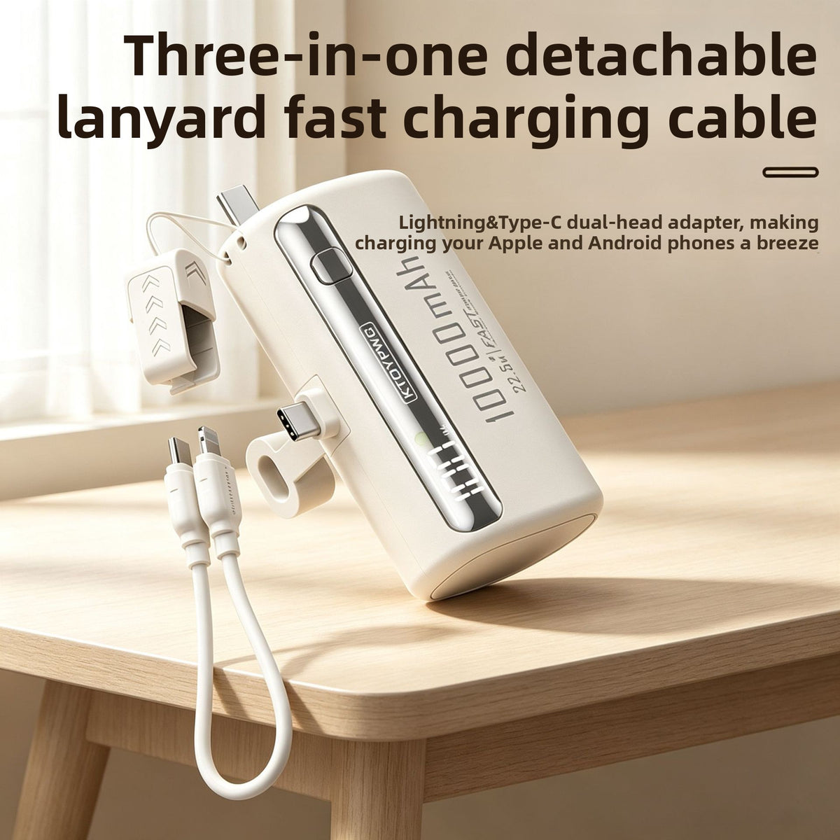 White 10000mAh capsule power bank with a fold-out Type-C plug and a detachable lanyard charging cable