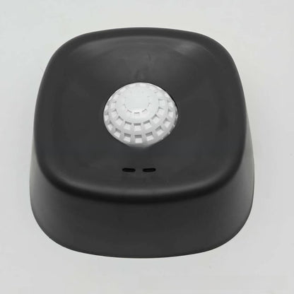 Dog slow feeder lick bowl shown from the front with its ridged tray and center ball