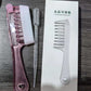 Heart cutout handle detail on the clear liquid guide scalp massage comb for hanging