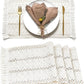 Folded knitted placemat showing how it stores flat in a drawer