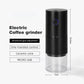 Black electric coffee grinder with a lit round button and clear cup, with 38 external gear adjustment text and size labels