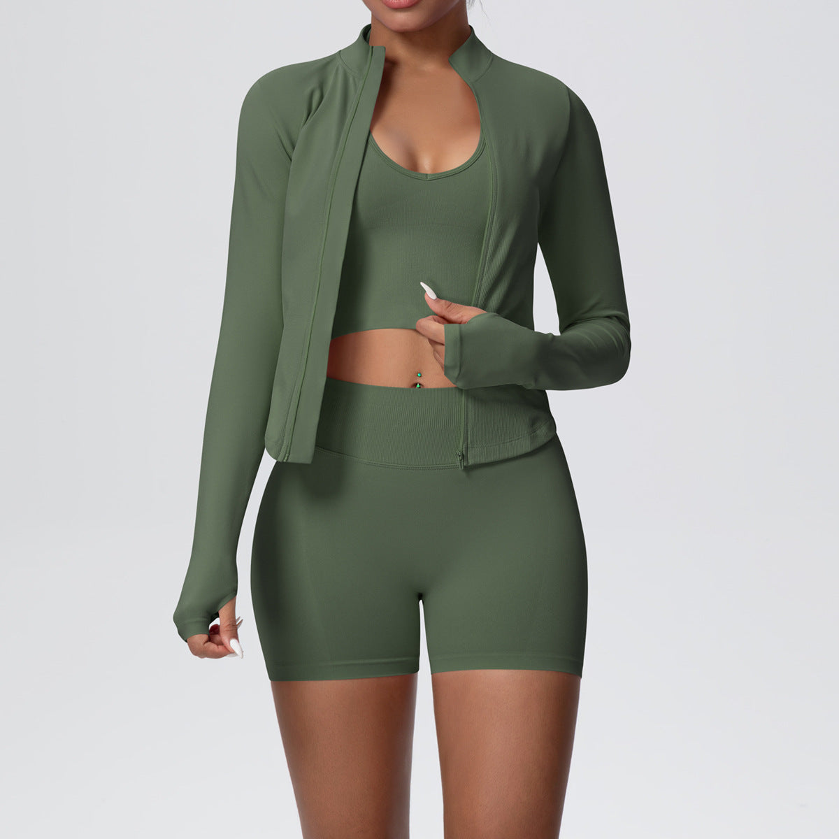 Olive green seamless yoga set with long sleeve zip jacket, cropped tank and high waist shorts