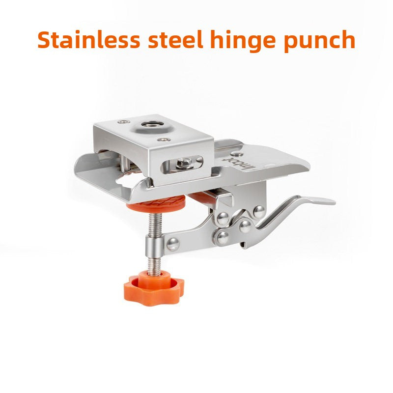 Stainless steel hinge punch with a lever clamp and orange rubber knob on a white background