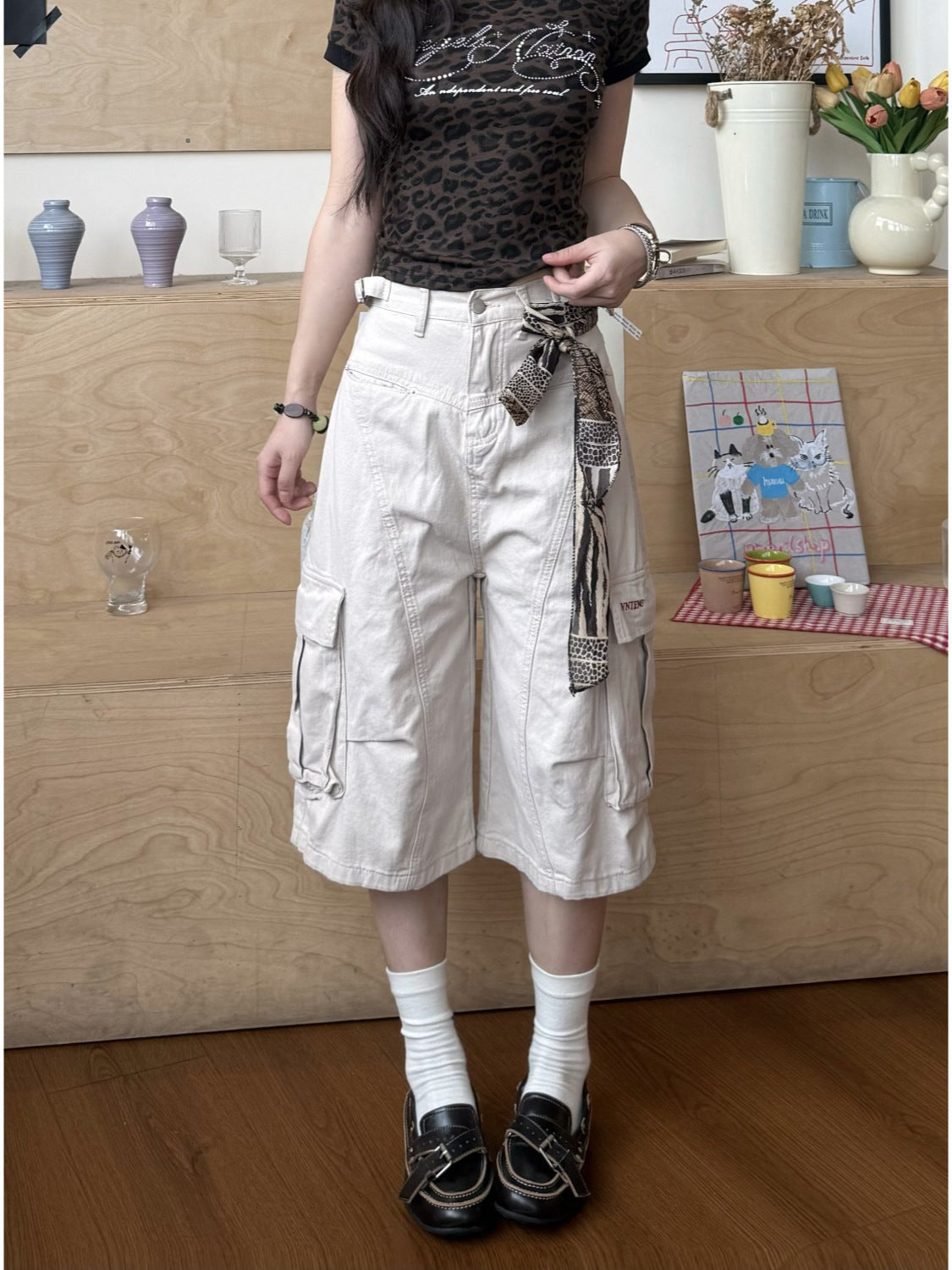 Khaki cream American retro loose wide leg cargo pants with flap side pockets front view