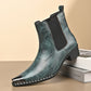 Teal green men's pointed toe Chelsea boot with crackled finish, elastic side panel and metal toe cap