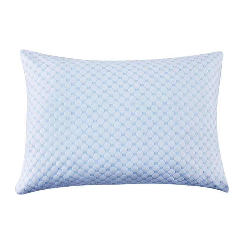 Rectangular memory foam bed pillow with a quilted cooling knit cover beside its unboxed foam pieces