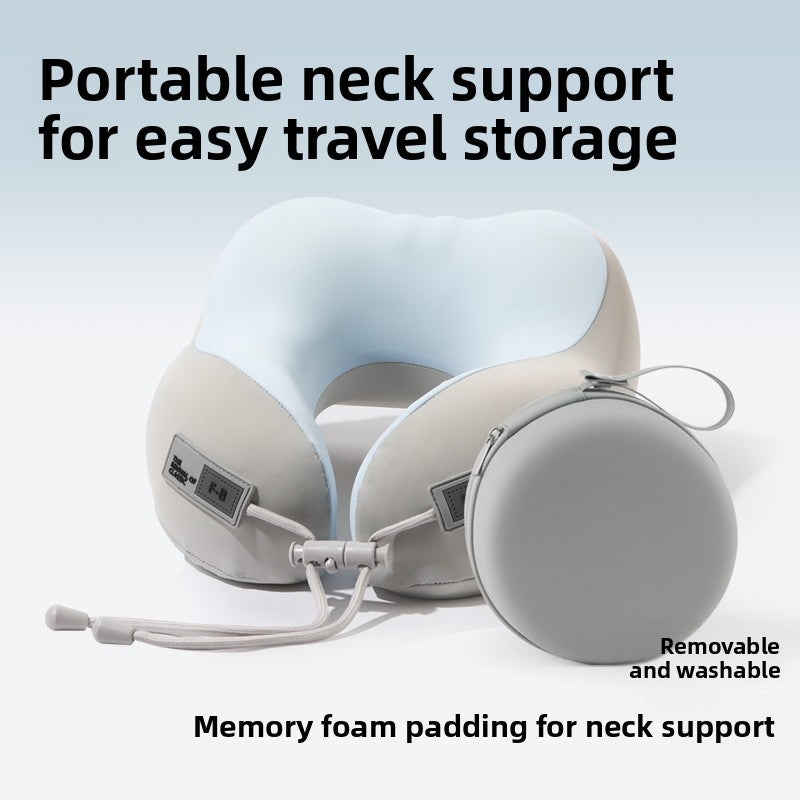 Pale blue and beige U shaped neck pillow beside a round gray storage box, adult size, single pillow option