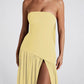 Side profile catching the curve through the waist and hip silhouette