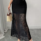Full length black floral lace mermaid maxi skirt on a model