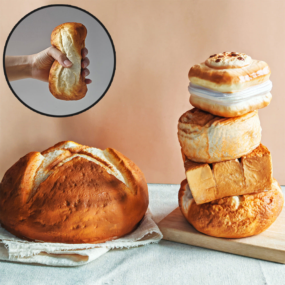 Hand pressing the bread squishy to show the slow rebound foam