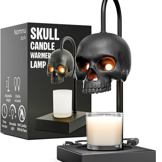 Two option view of the skull lamp shown as a candle warmer with a candle and as a table lamp without one