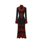 Dress on a wide wooden hanger inside an open wardrobe at home
