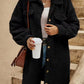 Womens plush fleece button front long coat in gray, worn open over a knit