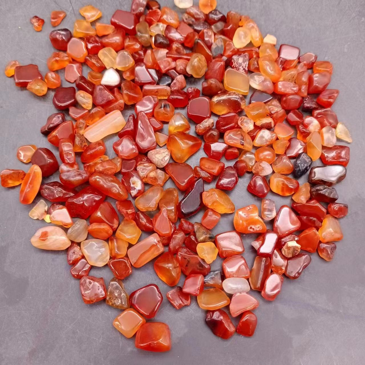 Tiger eye style tumbled stones with banded sheen for tabletop display