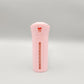 Gray and white rotating four compartment travel bottle for toiletries