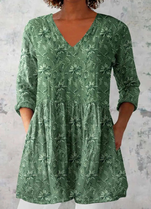 Digital print tunic with a soft V neckline worn loose with three quarter sleeves