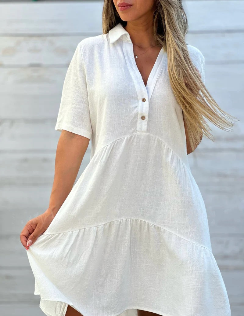 Yellow green short sleeve cotton and linen tiered shirt dress showing the tiered A line skirt and short sleeves