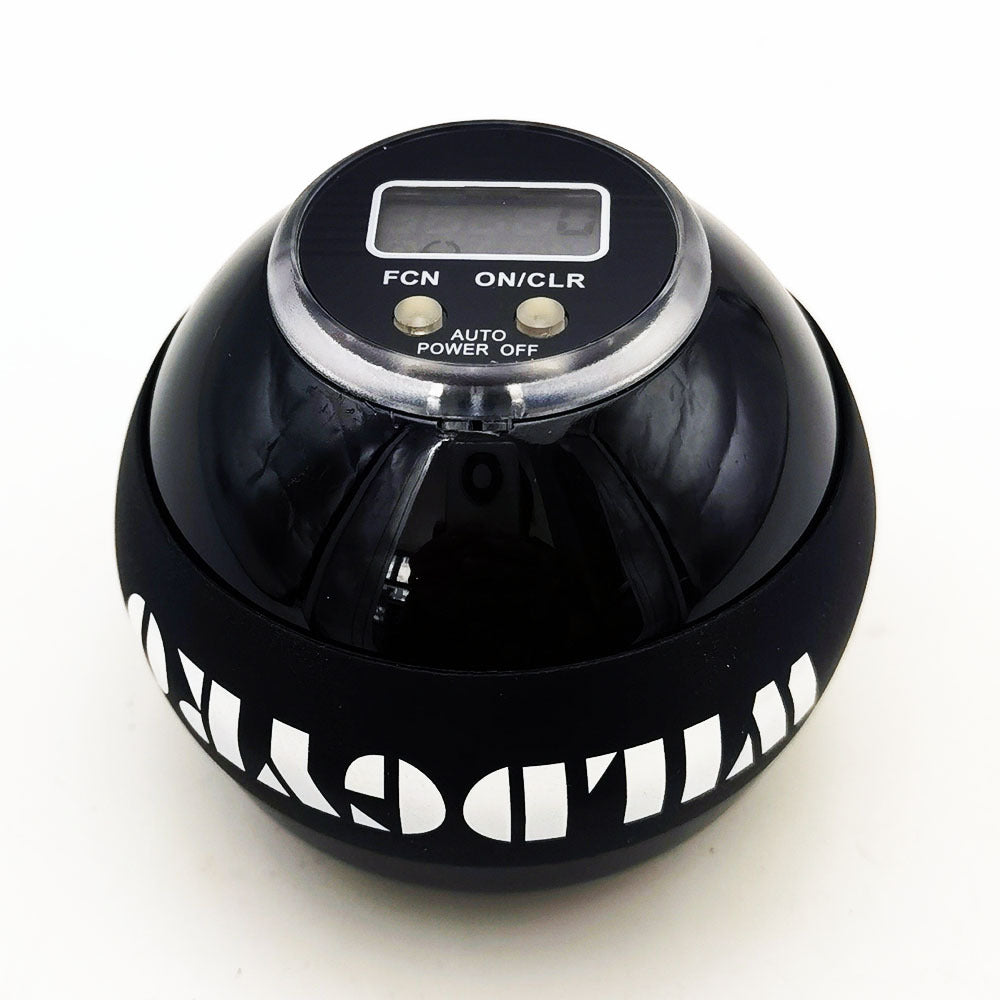 Wrist strength ball with an iron alloy core