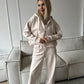 Light beige apricot zip front hooded sweatshirt and wide leg trousers set, Apricot color, worn by a model, the Size M option