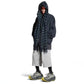Loose-fitting sweatpants worn for lounging at home with a casual tee