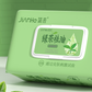 Close-up of the white snap lid and green tea leaf label on the green JiAnHe cleansing wipes pack