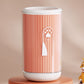 Orange pet paw wash cup with a white paw print graphic, large size, on a studio pedestal