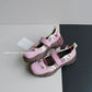 Pink platform slip-on shoes with a pink strap, fuchsia elastic cords and a brown lug sole, EU size 39 option