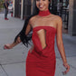 Red backless dress styled with neutral heels and minimal jewellery