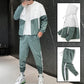 Color-block hooded tracksuit set in white and green worn with joggers, jacket detail