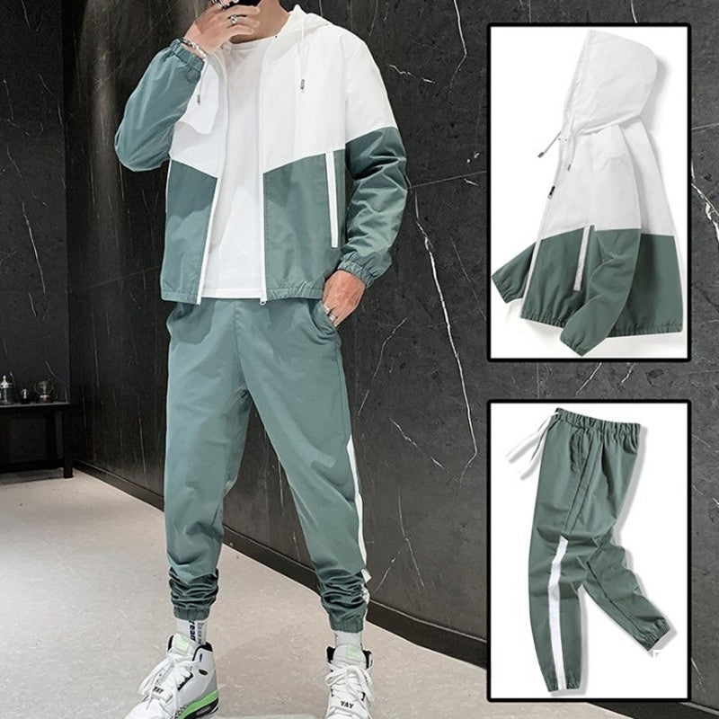 Color-block hooded tracksuit set in white and green worn with joggers, jacket detail