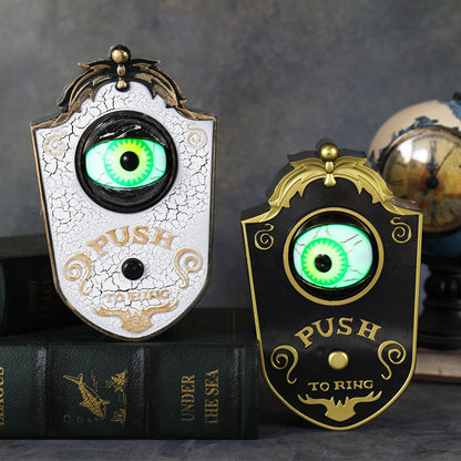 Halloween eyeball doorbell props, black and white ornate PVC plaques each with a green glowing eye and Push To Ring