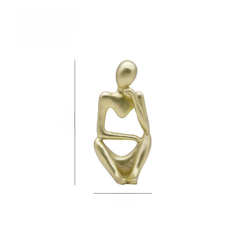 Matte resin abstract meditator figurine in a seated pose as a minimalist tabletop accent