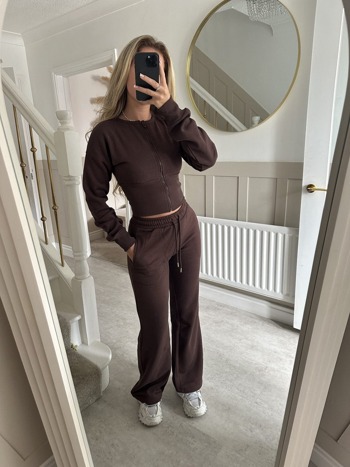 Womens two piece lounge set, a front zip jacket and straight leg drawstring pants in a soft sweat knit