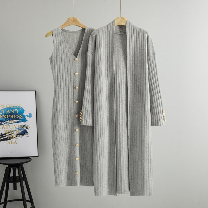 Grey ribbed knit dress and matching long cardigan displayed together on wooden hangers