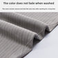 Close up of grey ribbed nylon maternity legging fabric folded on a light surface