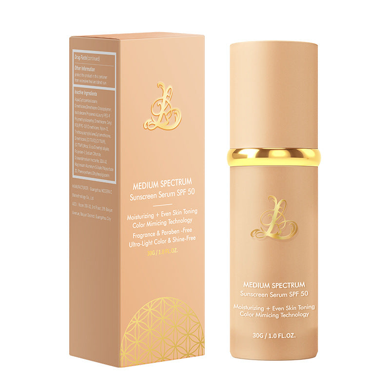 Peach retail carton and matching pump bottle of the 30 g color changing foundation serum side by side on white