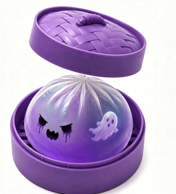 Purple ghost squishy dumpling toy in a purple steamer with the woven look lid propped open