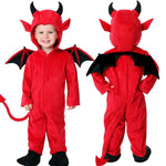 Child in a red plush devil costume with horned hood and black wings, front and back views