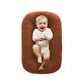 Colour and tone detail of the cotton covered baby lounger nest bolster