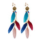 Boho vintage clip-on drop earrings with fringe and bead accents, zinc alloy build, studio image on white background