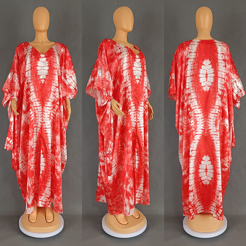 Tie dye batwing kaftan maxi dress with marbled print falling to the ankle, front view