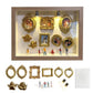Natural wood shadow box with six gold mini photo frames, two cherubs and figurines above the loose pieces