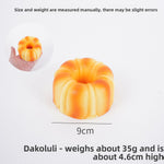 Hand squeezing the soft PU slow rebound food squishy sensory play toy