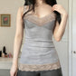 Gray slim camisole worn as a layering top under an open shirt