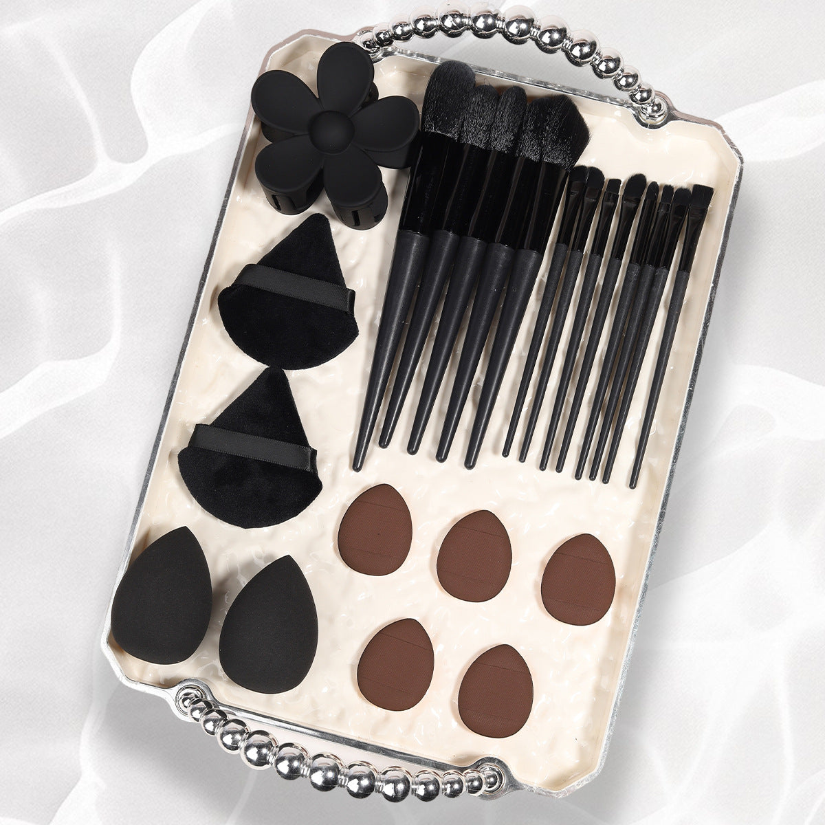 Makeup sponge set with teardrop and olive foam blenders and soft velvet powder puffs